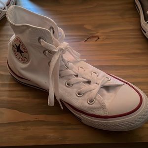 White high top converse left shoe